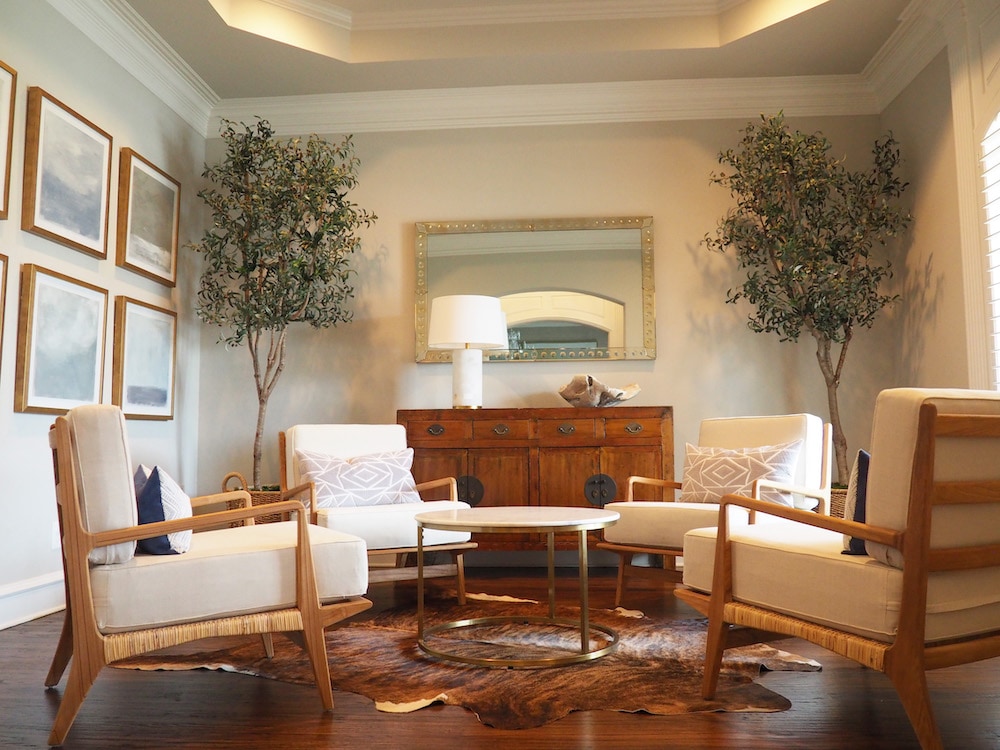 A_pair_of_custom_designed_artificial_olive_trees_complete_this_room_designed_by_Cheryl_Ketner_Interiors.jpg