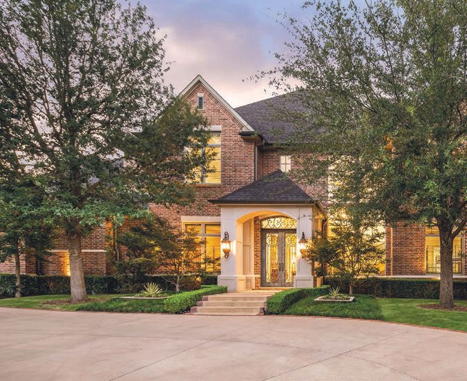The home’s exterior boasts a private gated entrance and motor court. PHOTO BY COSTA CHRIST MEDIA