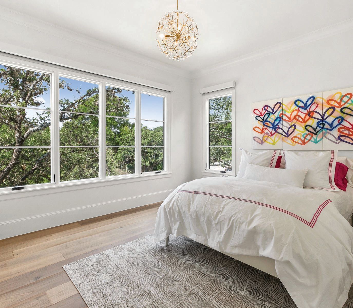 Each bedroom boasts its own personal charm PHOTOGRAPHY BY JPM REAL ESTATE PHOTOGRAPHY