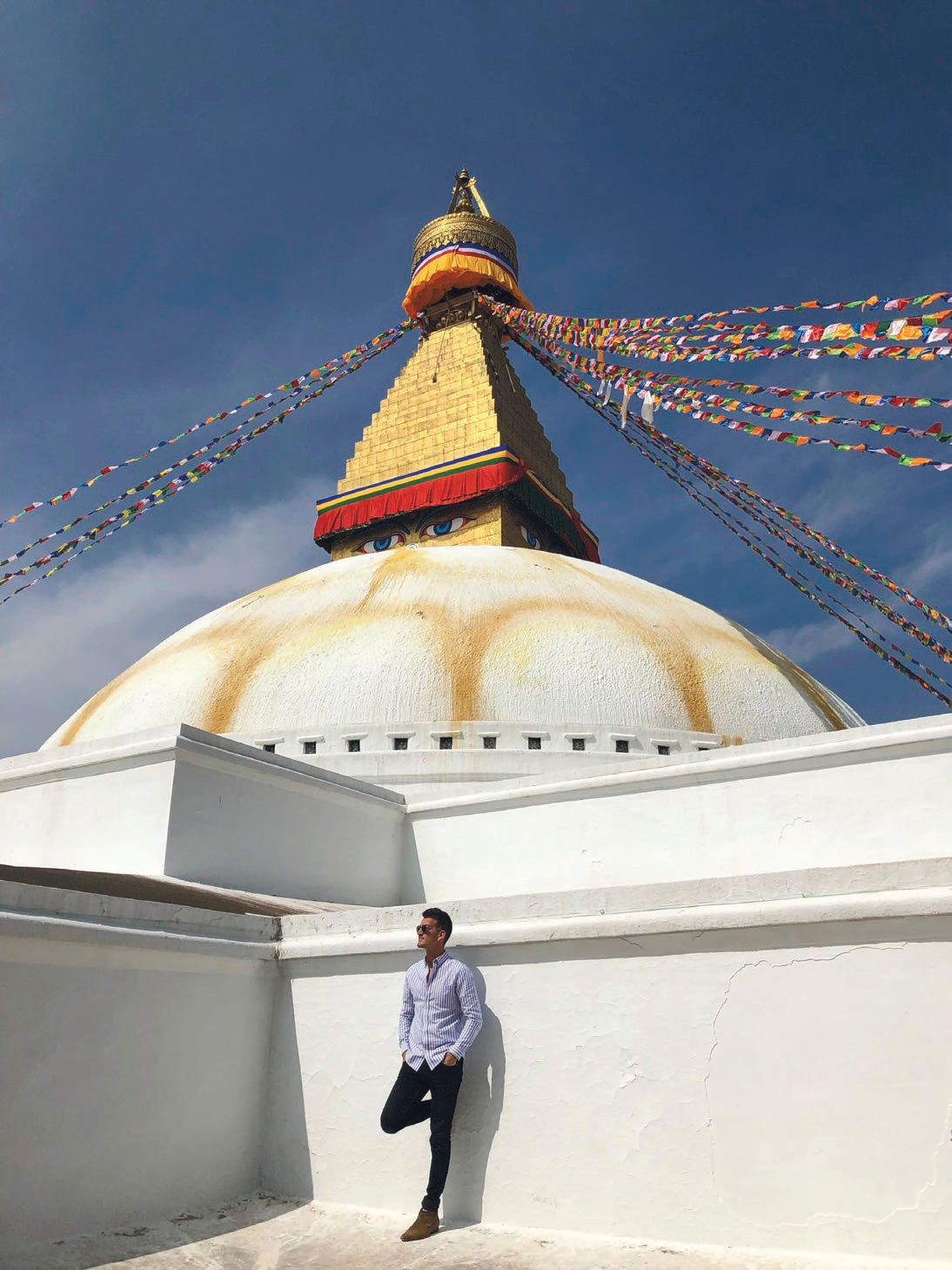 Shumway-Jones strikes a pose at Boudha Stupa in Kathmandu PHOTO COURTESY OF ZACHARY SHUMWAY-JONES