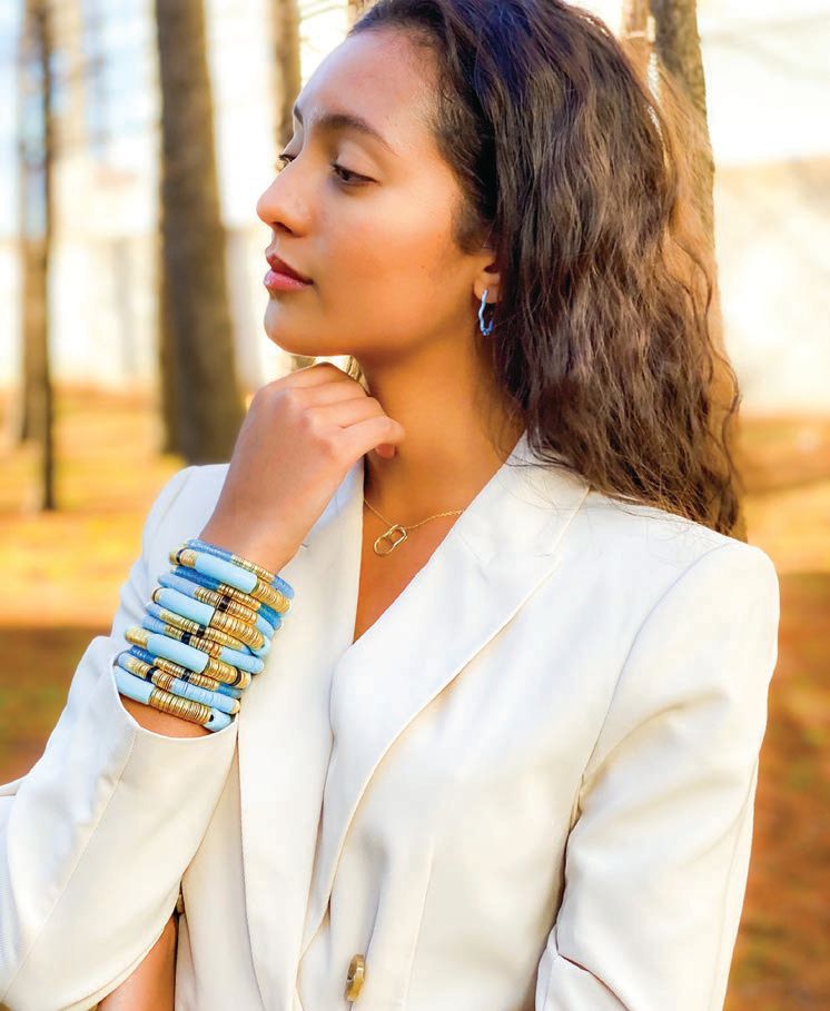 Allie   Bess’ signature stackable bracelets are paired here with the True necklace and Effie hoops PHOTO BY: MORGAN BROOME